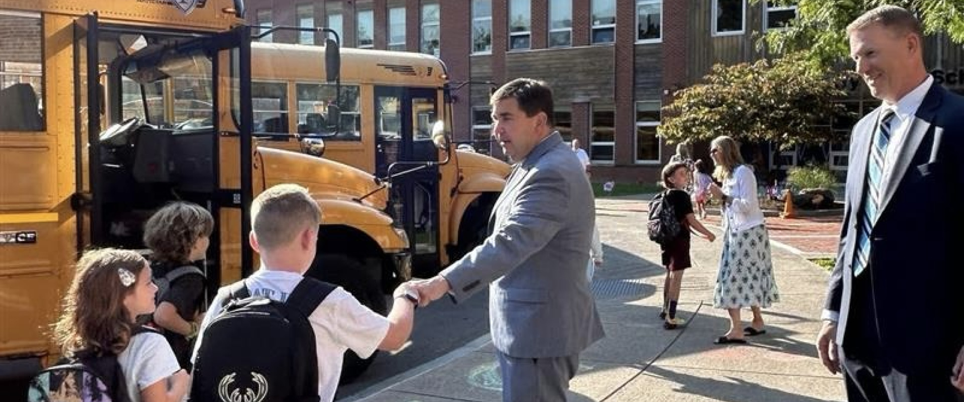 Cropped Student Fist Bump